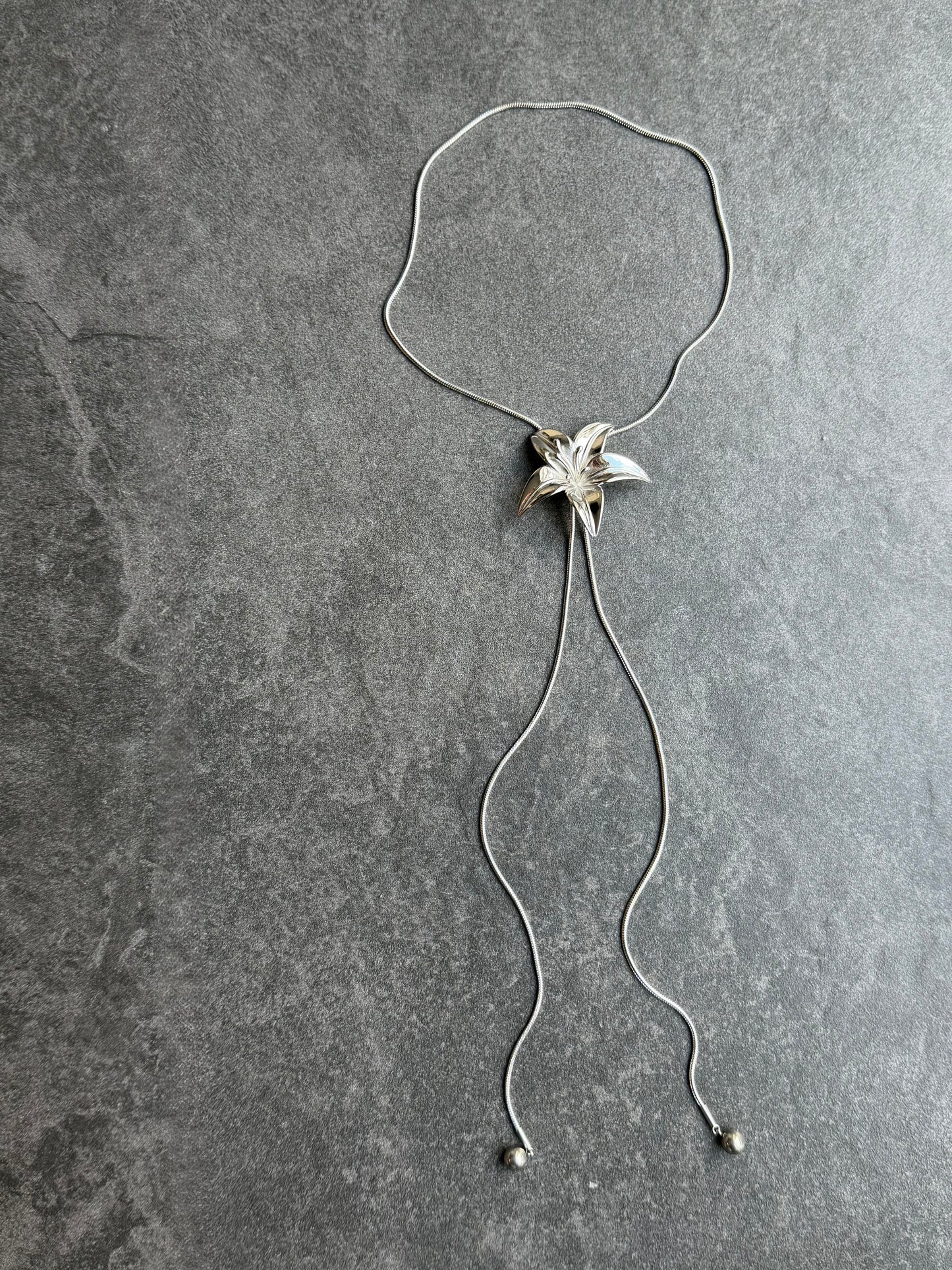 LIQUID LILY BOLO